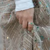 Anillo Tu y Yo con Diamantes y Esmeralda en Oro Bicolor